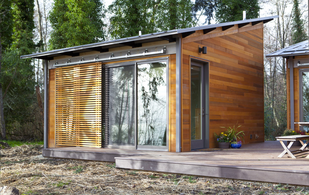 sliding box track screens on tiny modular house